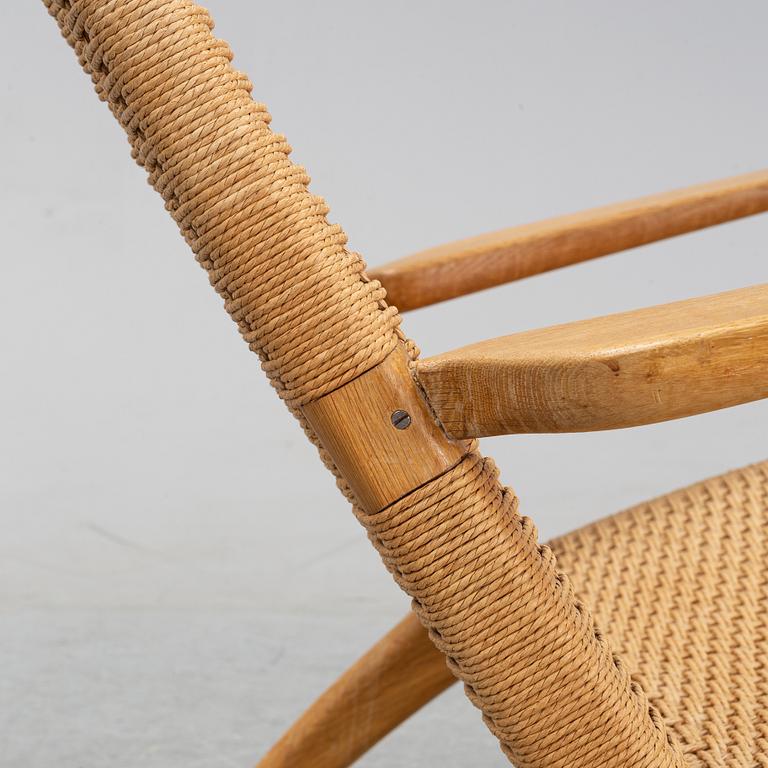 A 'CH-25' armchair designed by Hans J Wegner for Carl Hansen & Søn, Denmark.