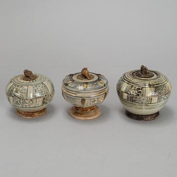 A set of three Sawankhalok boxes with covers, 15th / 16th Century.