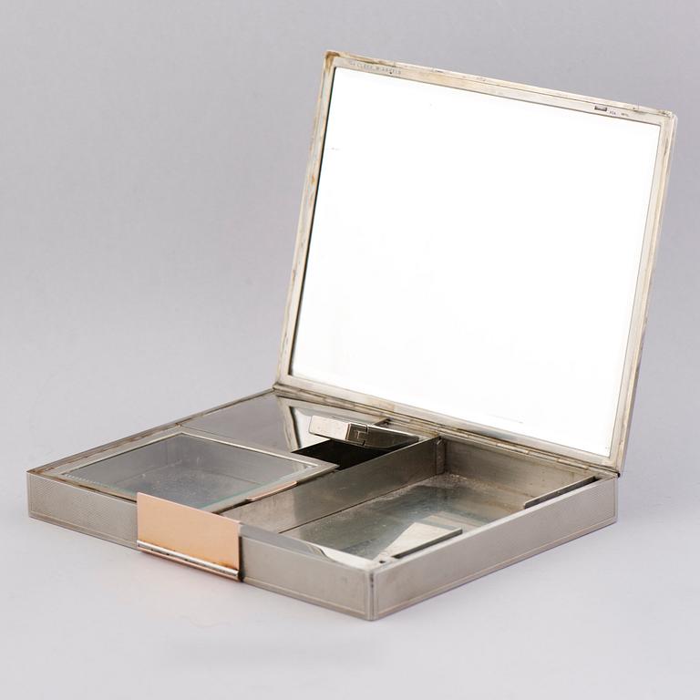 A MAKE-UP CASE, base metal, 18K gold, rose cut diamonds. Van Cleef & Arpels, Paris 1930s.