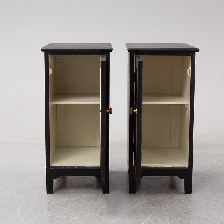A pair of early 20th century bedside tables / cupboards.