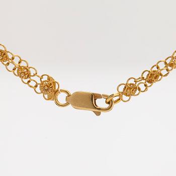 An 18K gold filigree necklace. Foreign hallmarks.