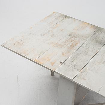 A 19th century gate-leg table.