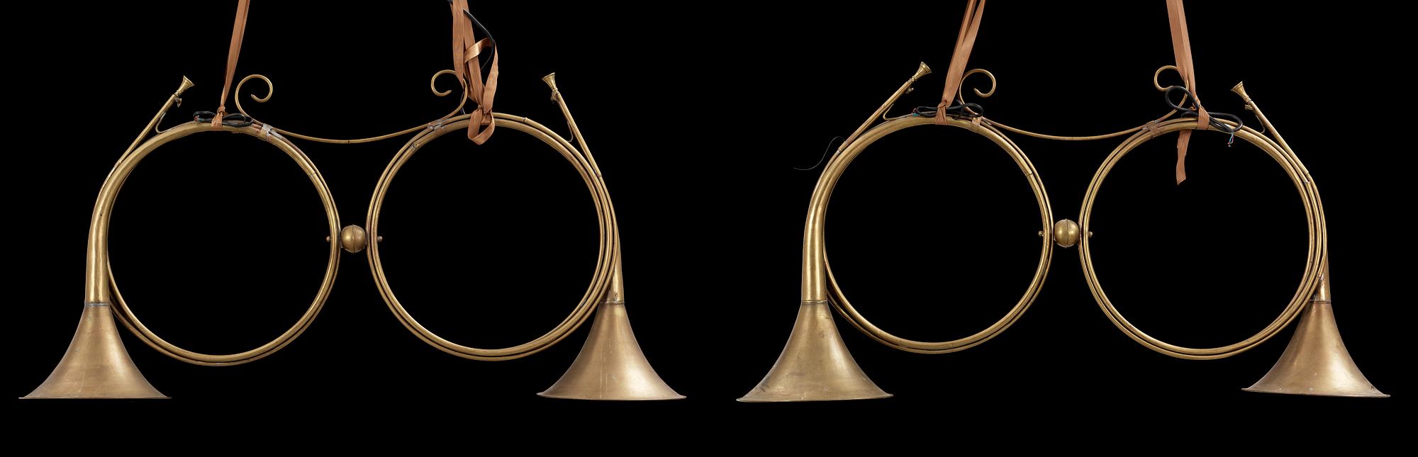 A pair of brass luminaires. 19th Century.