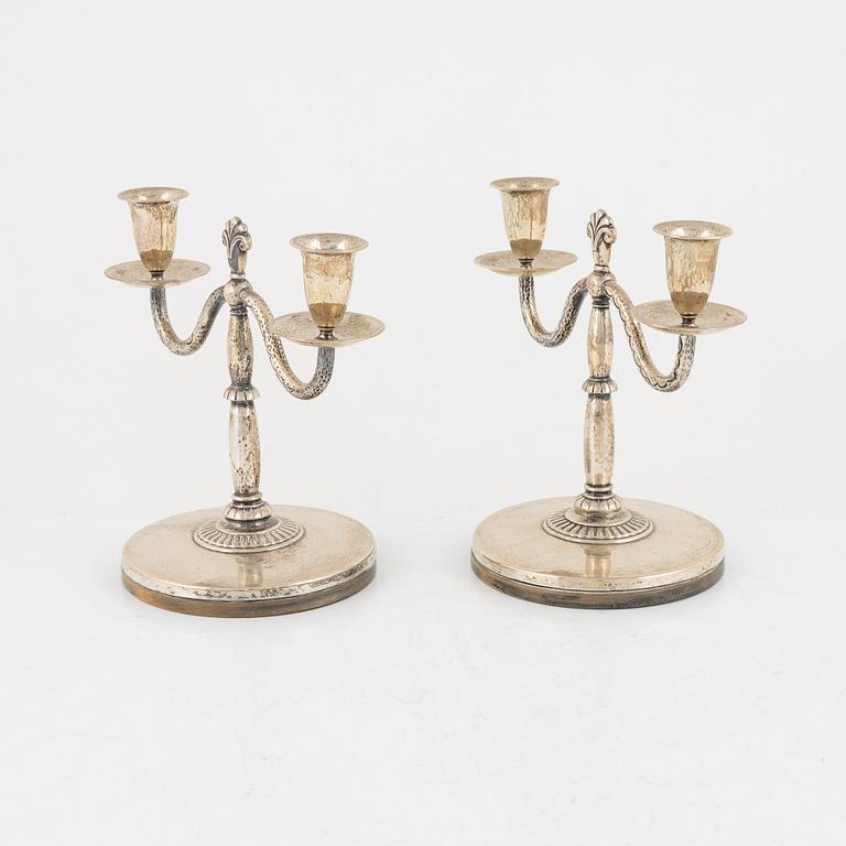 A pair of Swedish silver candlesticks, mark of CG Hallberg, Stockholm 1926.