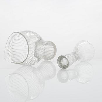 Tapio Wirkkala, four line-cut clear glass vases, signed Tapio Wirkkala Iittala.