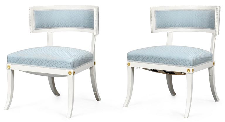 A pair of late Gustavian armchairs.