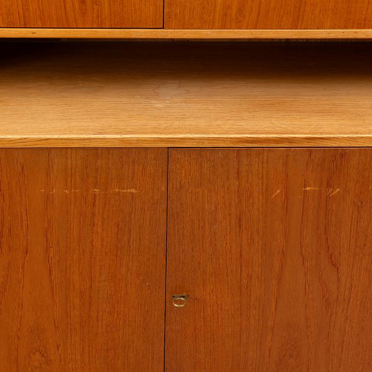 Hans J. Wegner, 2 cabinets and a shelf with a writing flap, Ry furniture, dated 1957.