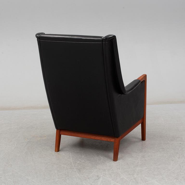 A mid 20th century easy chair.