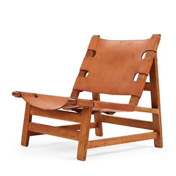 Børge Mogensen, an oak and natural brown leather easy chair model "2224", Fredericia Stolefabrik, Denmark, 1960s.