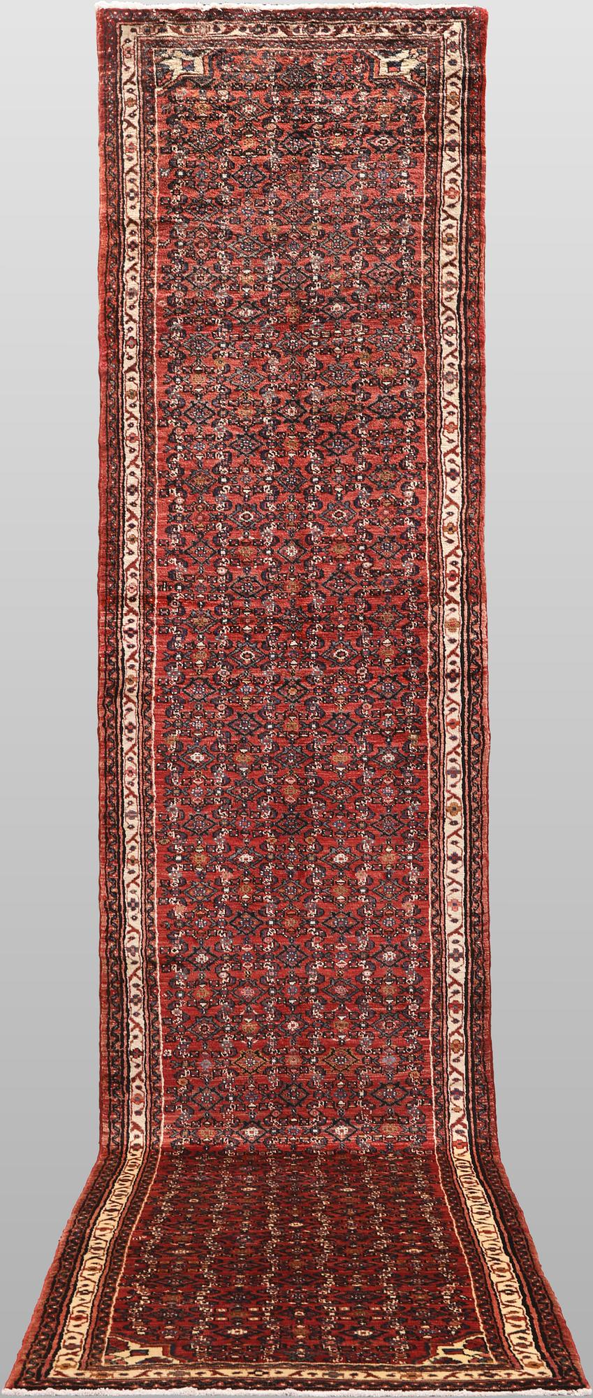 A Hosseinabad runner carpet, 500 x 93 cm.