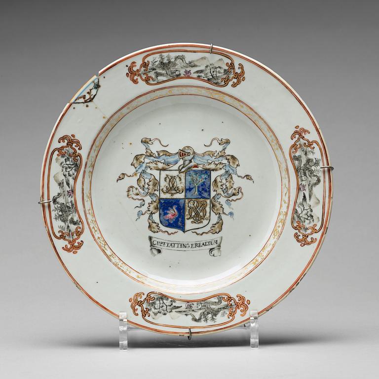 A set of four armorial dinner plates, Qing dynasty, Qianlong (1736-95).