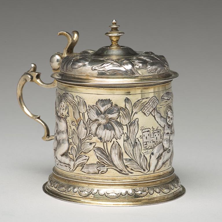 A German 17th century parcel-gilt silver tankard, mark of Hans Leonhard Huber, Augsburg (1637-1671).