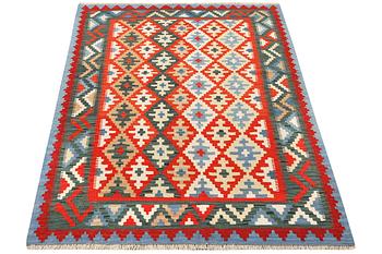 A Kilim rug, c. 202 x 150 cm.