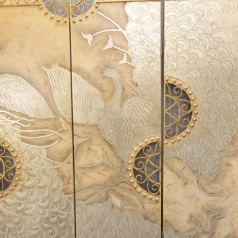 A 21st century metal and wood folding screen.