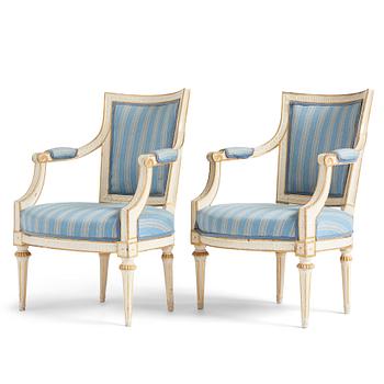 56. A pair of gustavian armchairs by Johan Lindgren (master 1770-1800).