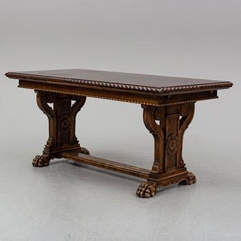 A mid 20th century baroque style dining table.