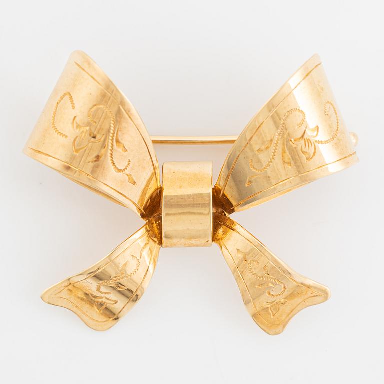 Brooch, bow, 18K gold. Stigbert, Engelbert, Stockholm.
