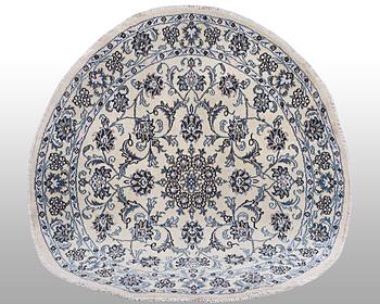 A rug, Nain, part silk, ca 146 x 146 cm.
