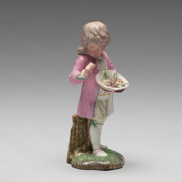 A Höchst porcelain figure of a boy, 1770's.