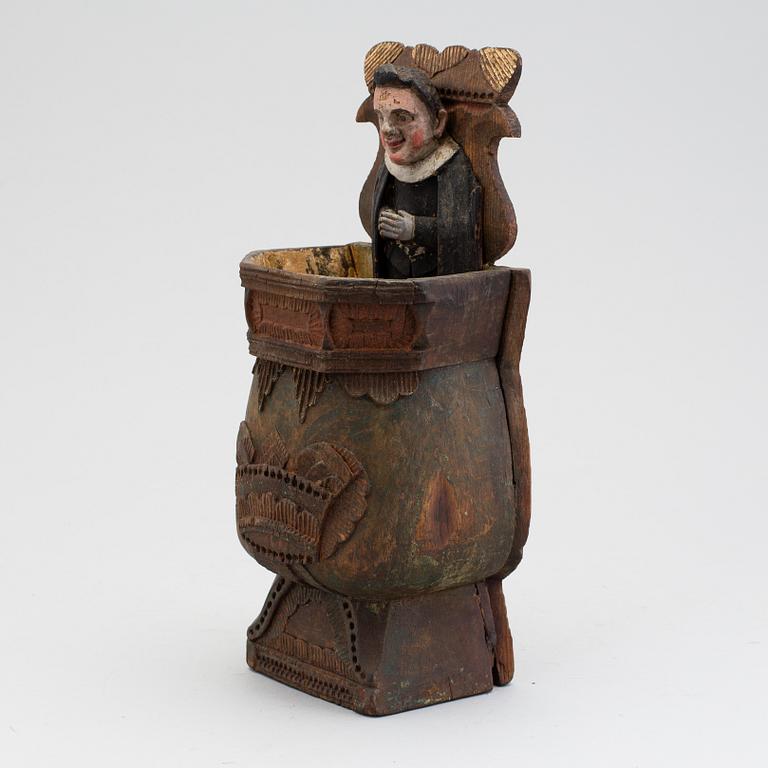 A carved and painted traditional folk art spoon holder from Jämtland 18/19th century.