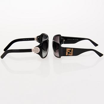 Pair of Sunglasses by Fendi and Chloé.