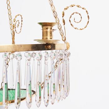 A late Gustavian gilt-brass and green glass six-light chandelier, late 18th century.