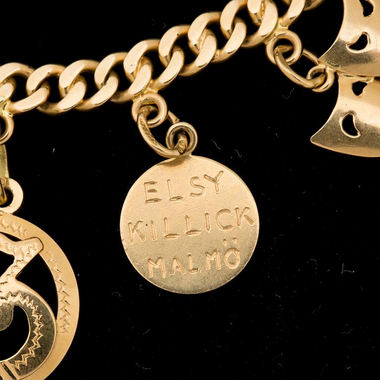 ARMBAND, 18k guld, med berlocker. Segir AB, Köping 1946. Vikt ca 30g.