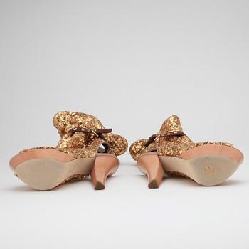 LOUIS VUITTON, ett par stövletter.
