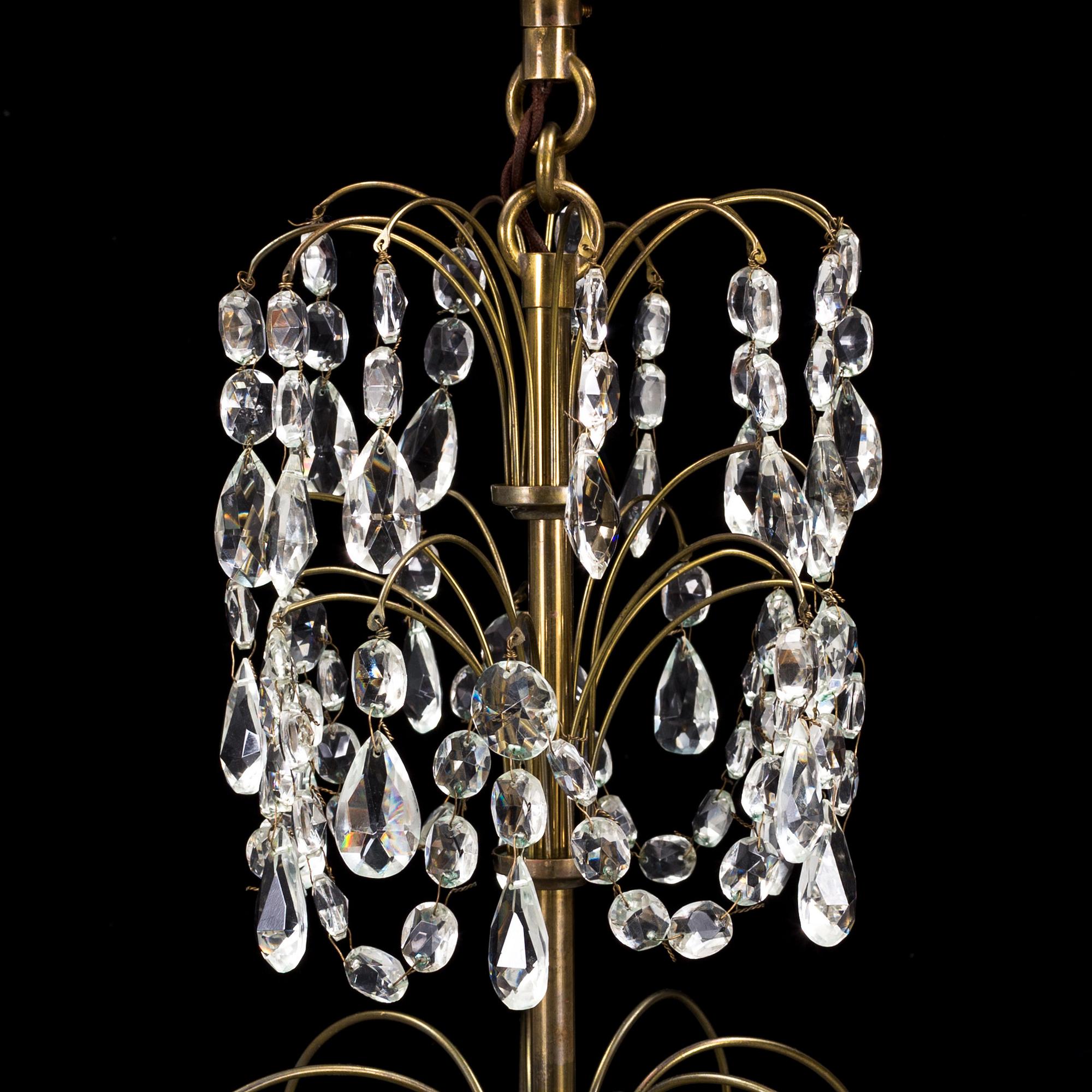 A mid-20th century, baroque style chandelier.