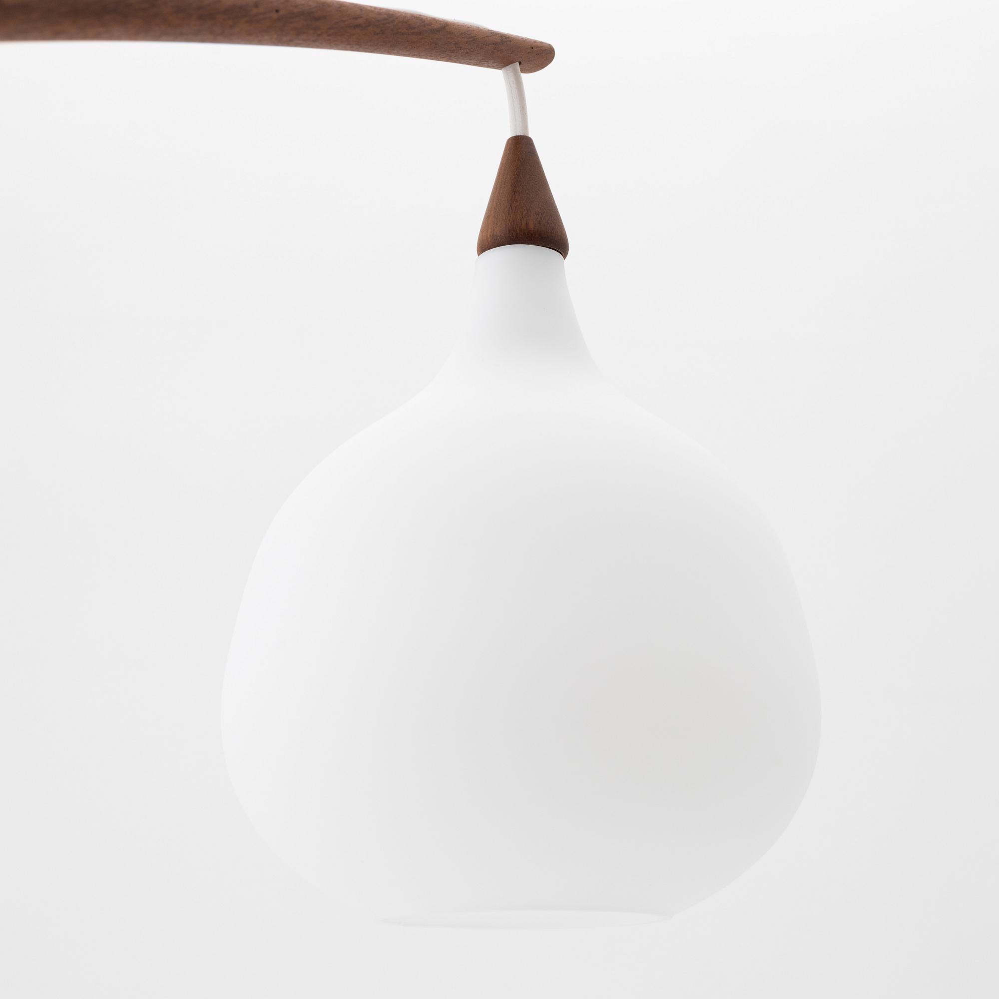 Uno & Östen Kristiansson, a teak and glass wall light, Luxus, Vittsjö.