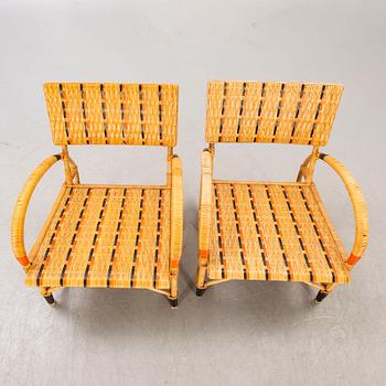 Armchairs a pair and table, 1930s-40s.