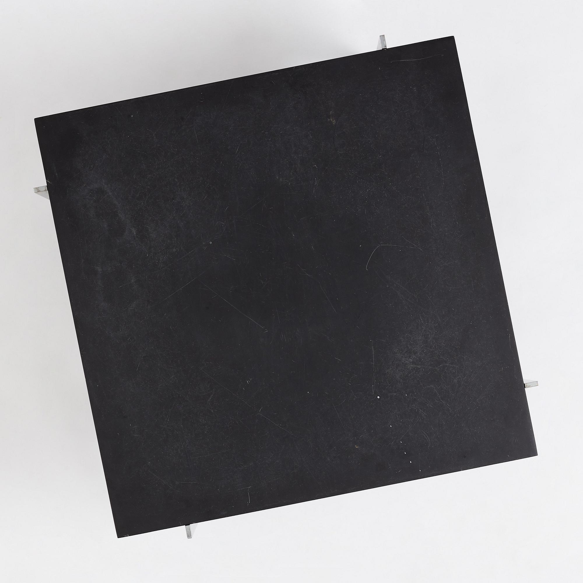 Poul Kjaerholm, a black stone top 'PK61' table, edition E Kold Christensen, Denmark.