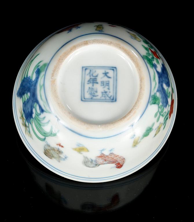 A rare doucai 'Chicken' cup, Ming dynasty, six character mark and period of Chenghua (1465-87).