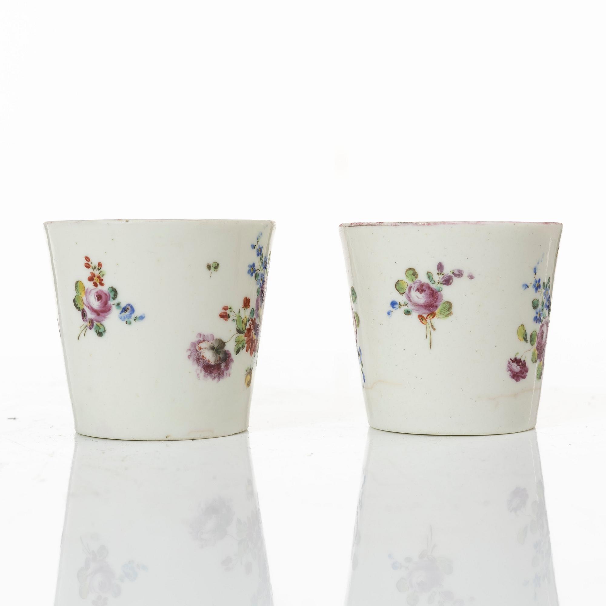 A pair of cups and saucers, France, 18th Century.