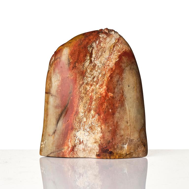 A group of carved nephrite and jade ornaments, China, Qing dynasty and older. (8 pieces).