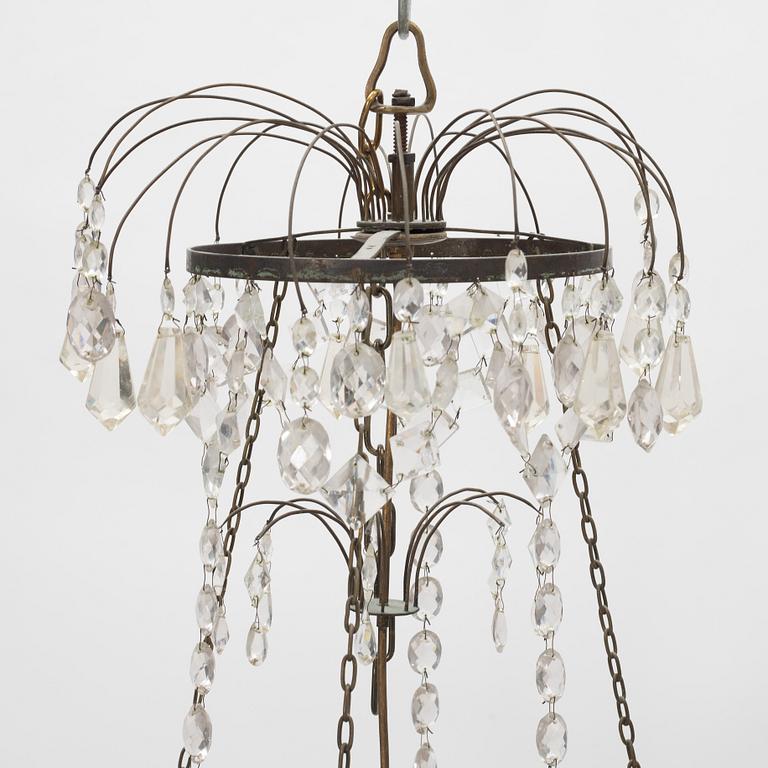 A Gustavian style chandelier, around the year 1900 incorporating older elements.