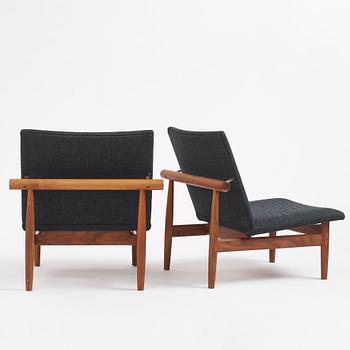 Finn Juhl, a pair of armchairs, "Japan", House of Finn Juhl, Denmark, 21st century.