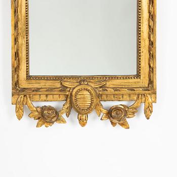 A Gustavian giltwood mirror, late 18th century.