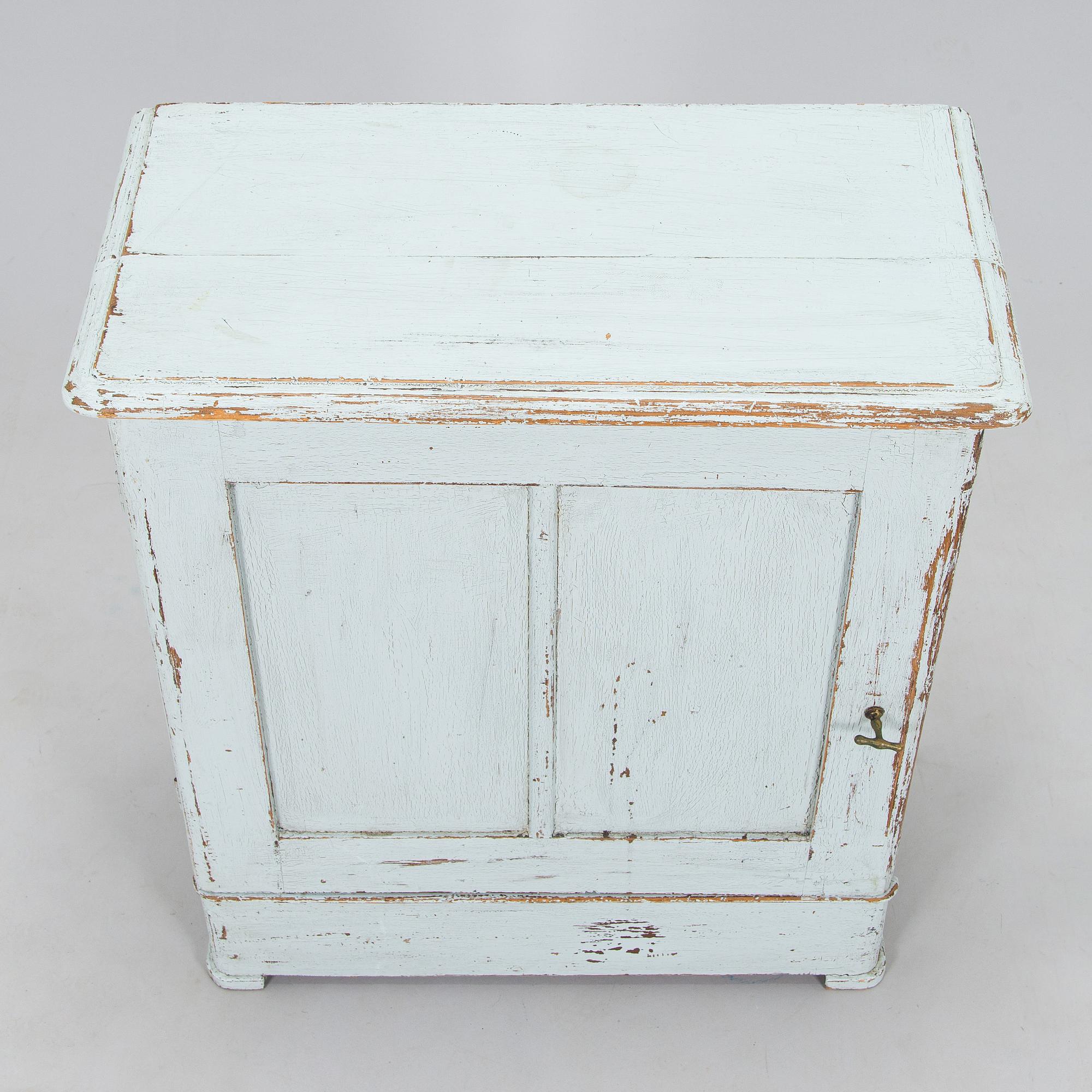 A painted cabinet, circa 1900.