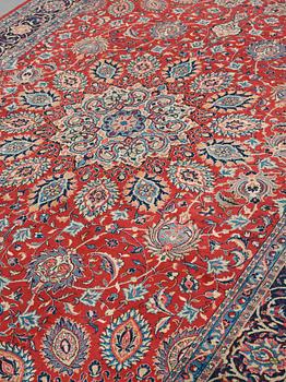 A carpet, a semi-antique/an old Persian, probably a Qazvin, ca 345-349 x 251,5-253 cm.