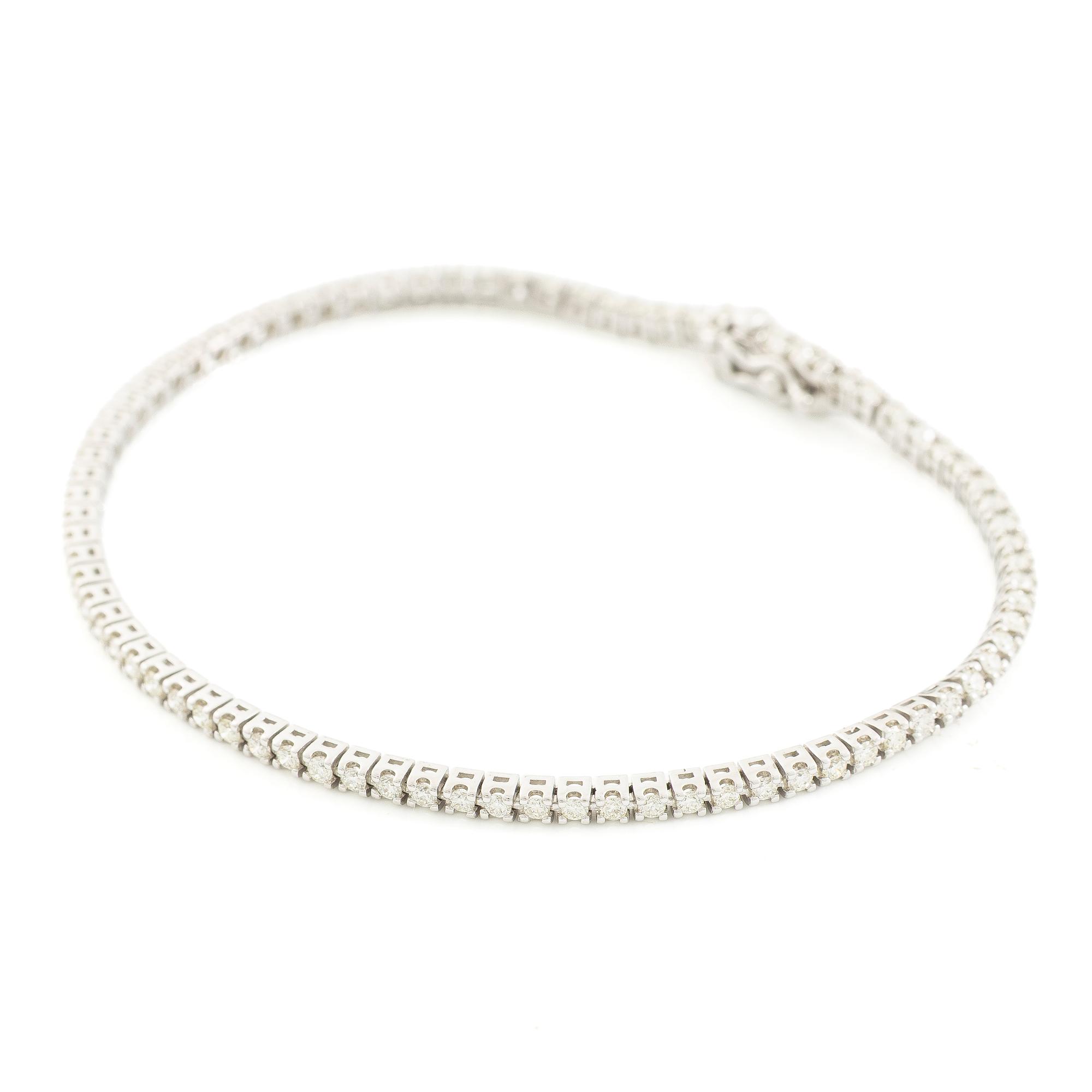 Tennisamband, 18K vitguld med briljantslipade diamanter.