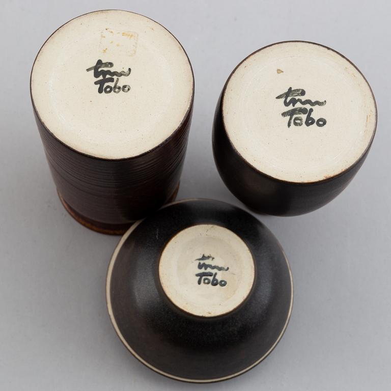 Erich & Ingrid Triller, a glazed stoneware lidded bowl and two vases, Tobo.