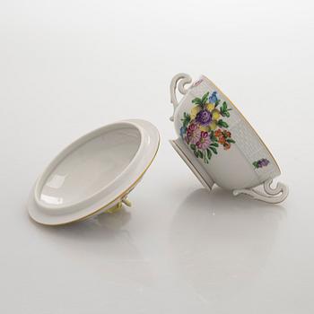 A pair of Herend porcelain candlesticks, and a lidded sugar bowl, Hungary.