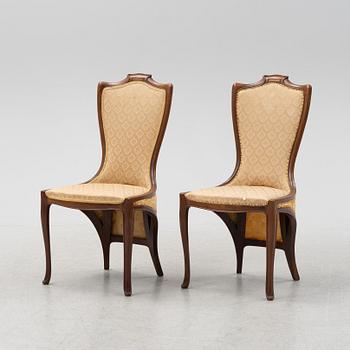 A pair of mahogany art nouveau chairs by Edward Colonna for Samuel Bing, Paris, early 20th Century.