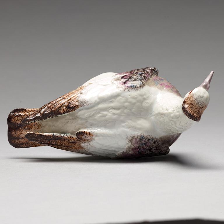 A porcelain figure of a dove, possibly Samson.