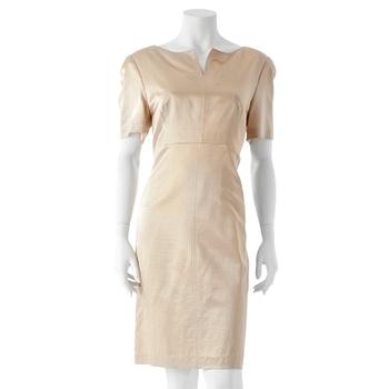 640. LAURÈL, a wool and silk gold shimmering dress.