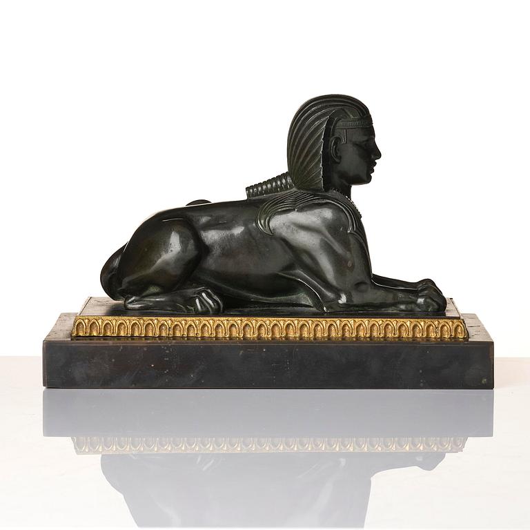 A French Empire bronze sfinx.