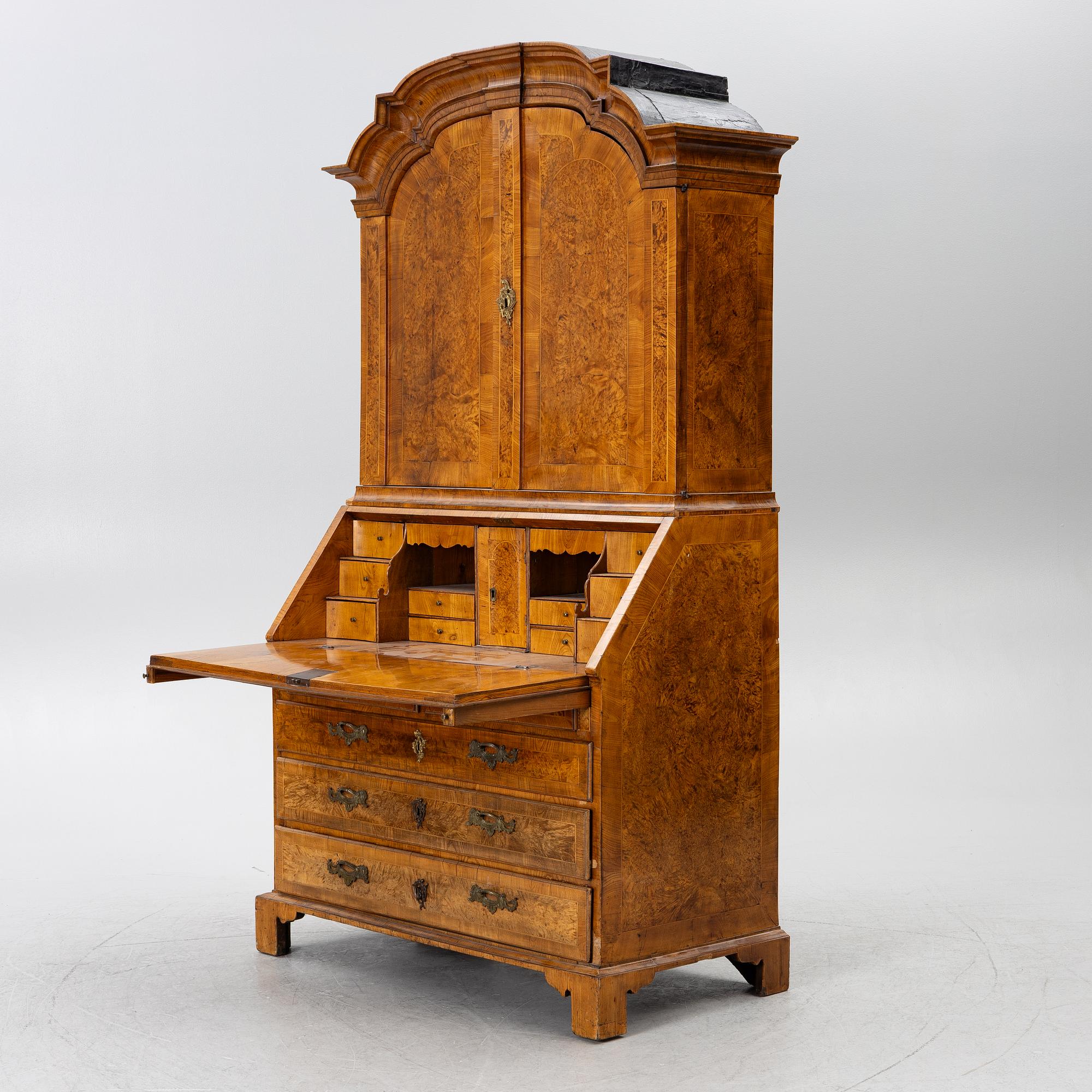 A Swedish rococo burr-alder veneered cabinet, later part 18th century.