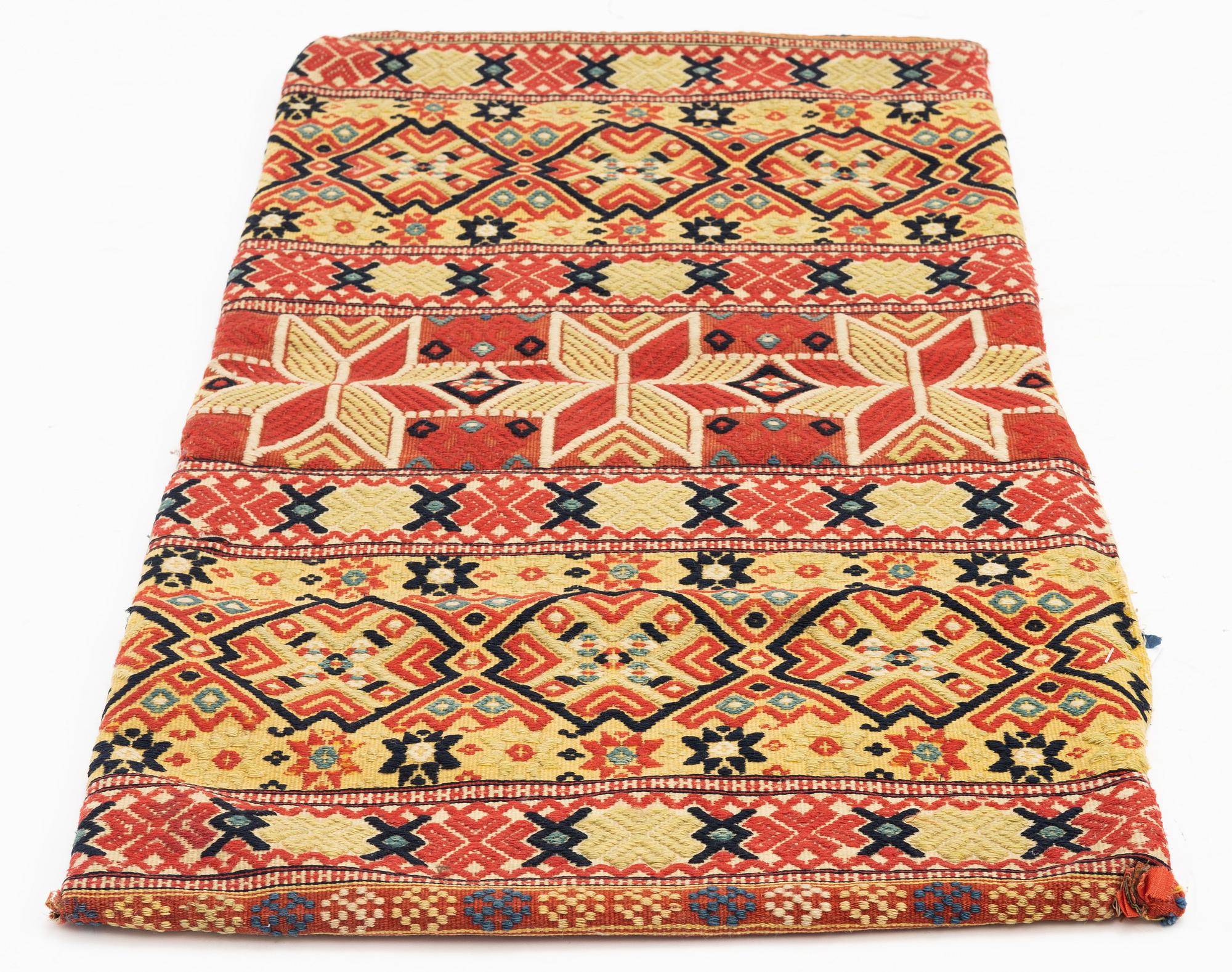 A, 19th century flat weave carrige cushion, c 102 x 51 cm, probably Järrestads district.