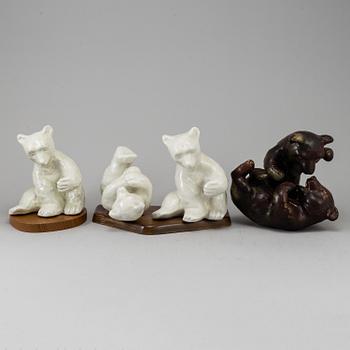 a set of three stoneware/ceramic figurines, including one by Karl Grössl.